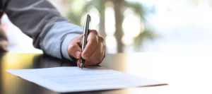 Person signing prenup