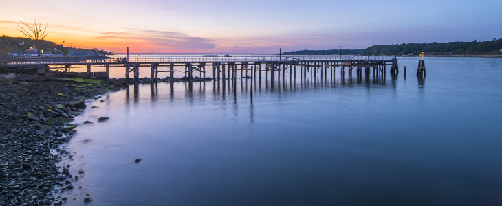 Scenic view of a local dock in Garden City, NY during sundown
