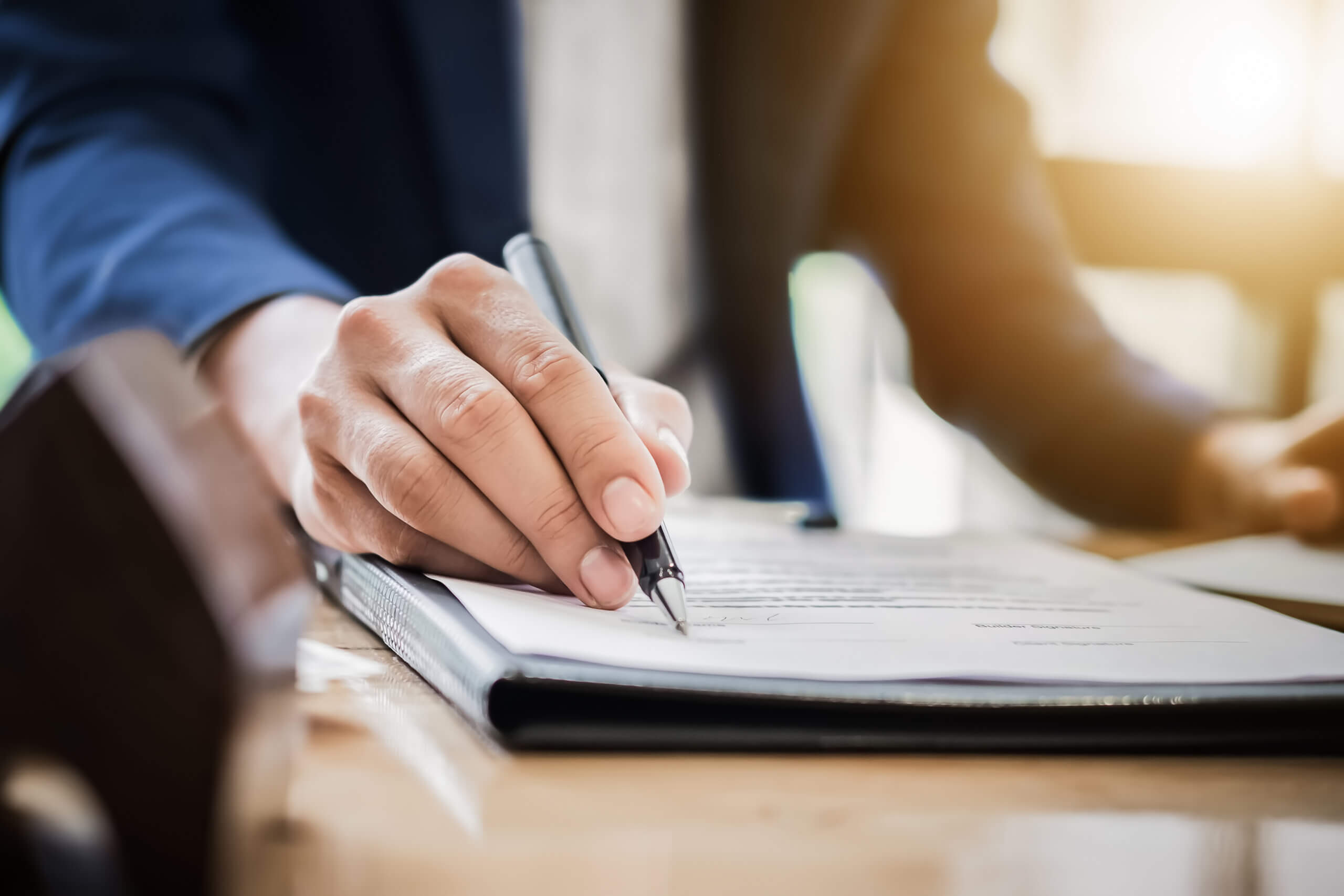 man reviewing divorce papers