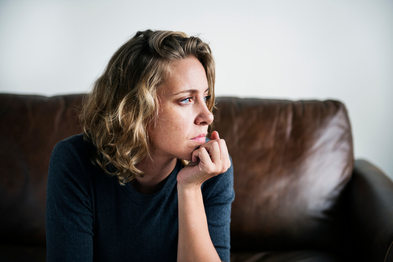 A woman sitting on the couch