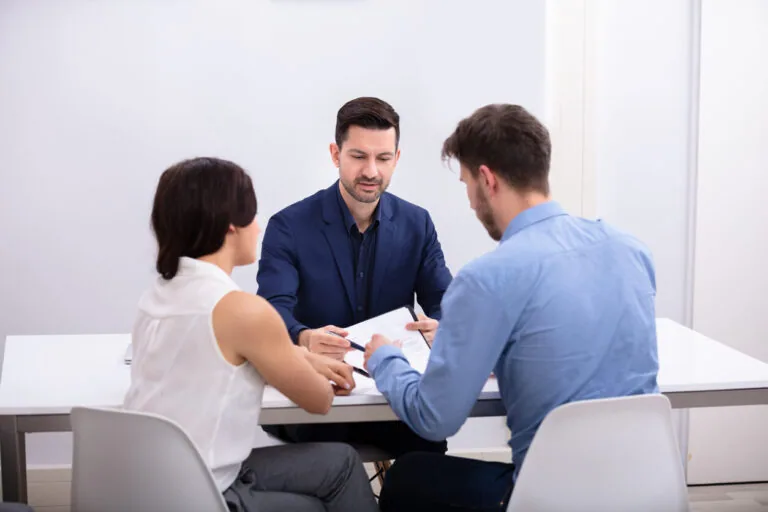 divorcing couple with mediator