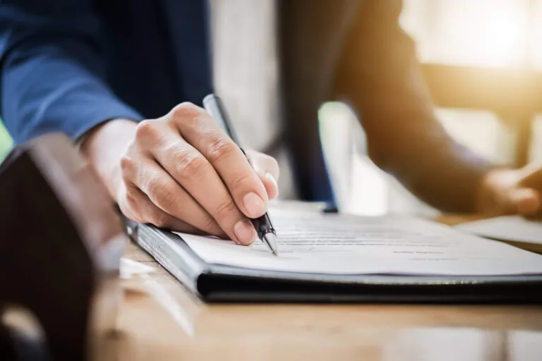 man reviewing divorce papers