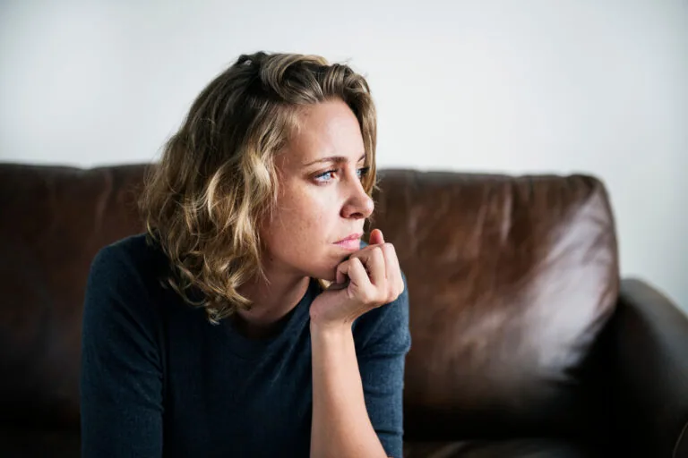 A woman sitting on the couch